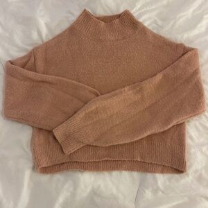 Women’s pink turtleneck fluffy sweater